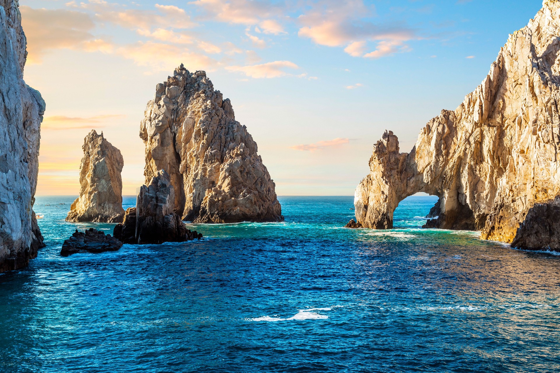 Early sunset view of the El Arco Arch at the Land's End rock formations on the Baja Peninsula, at Cabo San Lucas, Mexico.